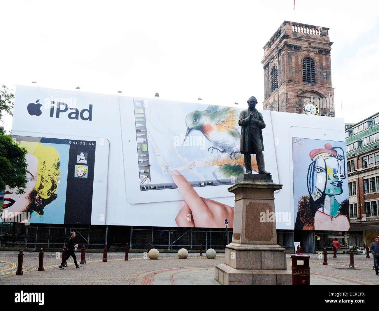 St Ann`s Church with iPad advertising banner in Manchester UK Stock Photo